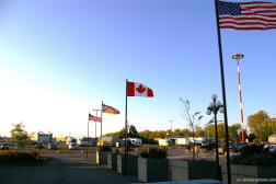 US and Canadian flags at the Victoria cruise port.jpg