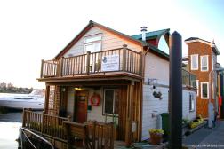 A two level floating house at the Fisherman's Wharf in Victoria listed for sale.jpg