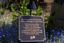 Plaque Raven Beaver with Grouse Otter with pups & clam, Frog totem pole at the Butchart Gardens.jpg