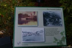 Ross Fountain Lookout sign at the Close up of the dancing fountain water jets at the Sunken Garden Lake  of the Butchart Gardens