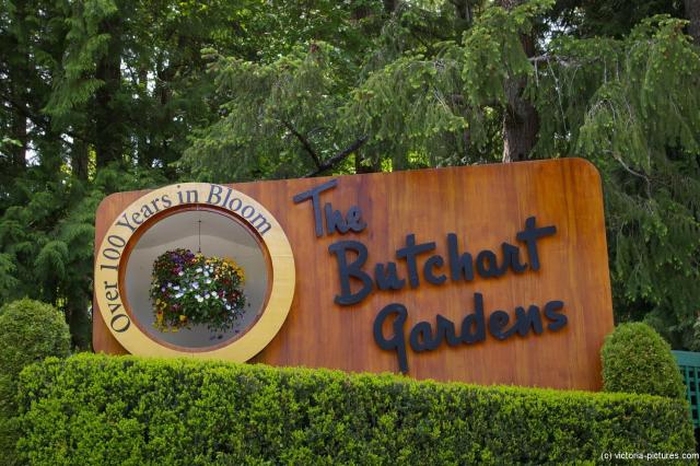 The Butchart Gardens sign Over 100 years in Bloom.jpg