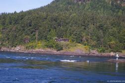 Nice home with large glass windows as viewed from ferry to Victoria.jpg